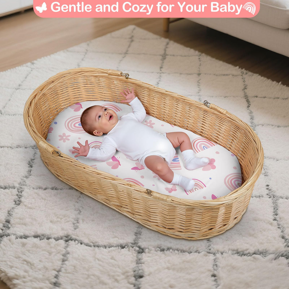 Unicorn Castle satin bassinet sheet with adjustable fit secures the mattress edge