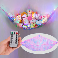 Unicorn Castle stuffed animal net hammock in a cozy nursery for clutter-free playtime