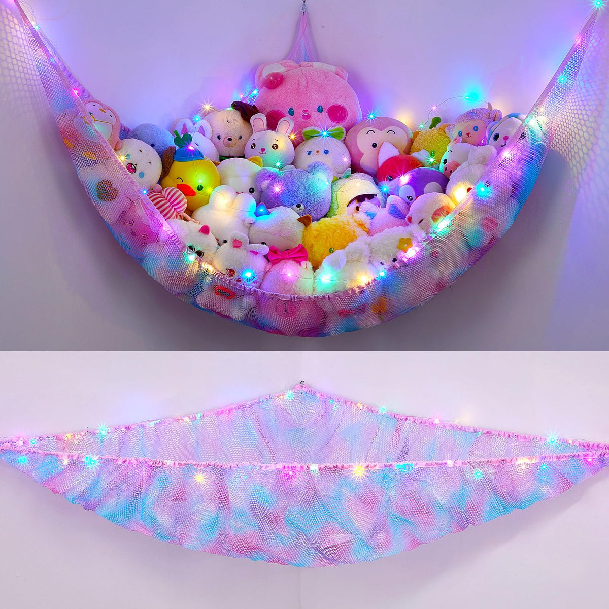 Unicorn Castle stuffed animals net hammock with ambient LED light creates a cozy playroom vibe.