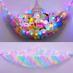 Unicorn Castle rainbow net hammock front view shows organized plush storage.