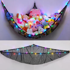 Unicorn Castle toy hammock hanging in a kid's corner for organized plush storage.