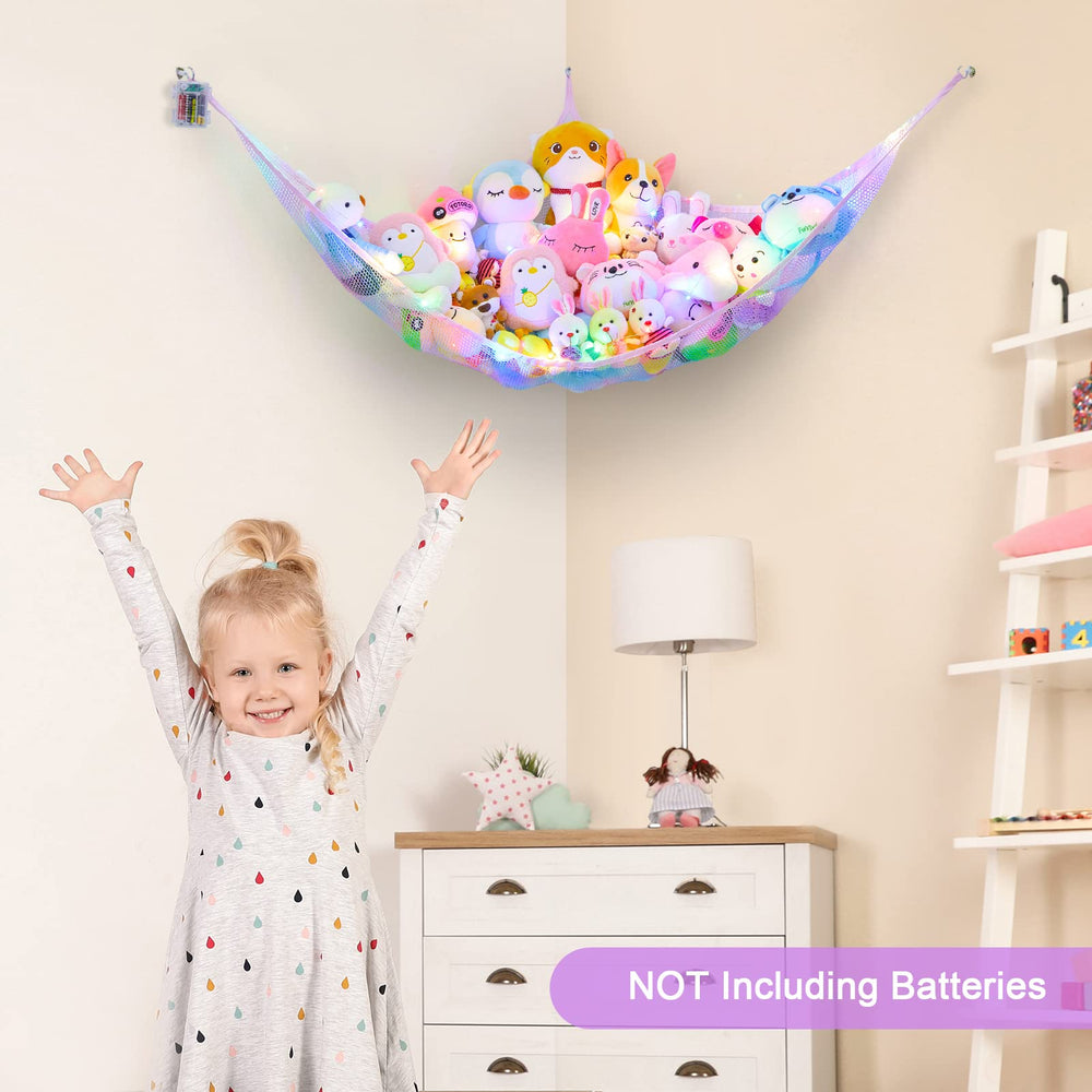 Unicorn Castle toy organizer in nursery demonstrates hanging storage solution