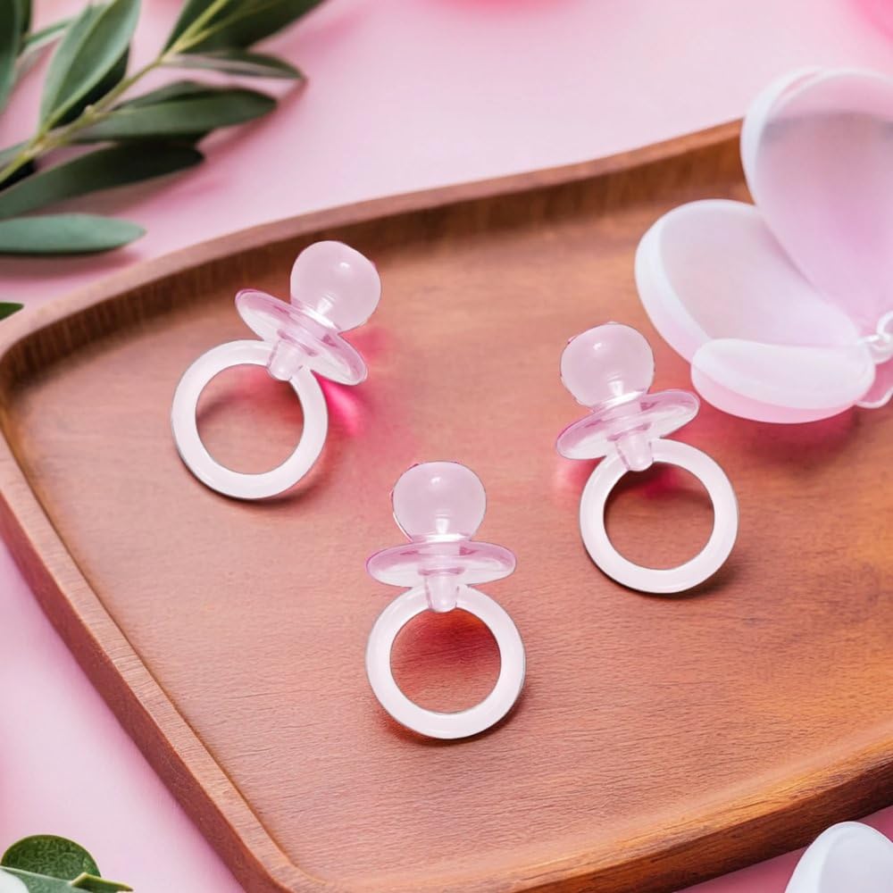 Unique pink acrylic crystal pacifier close-up demonstrating durable plastic and glossy finish for party decor.