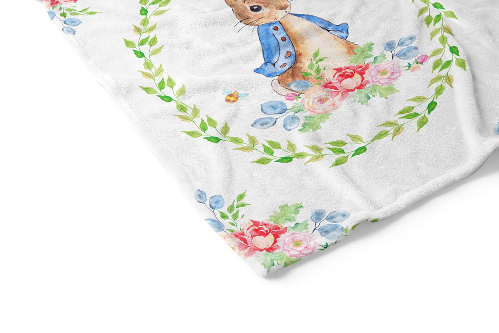 UNIQUE Rabbit blanket nursery scene shot illustrates gift-ready nursery decor