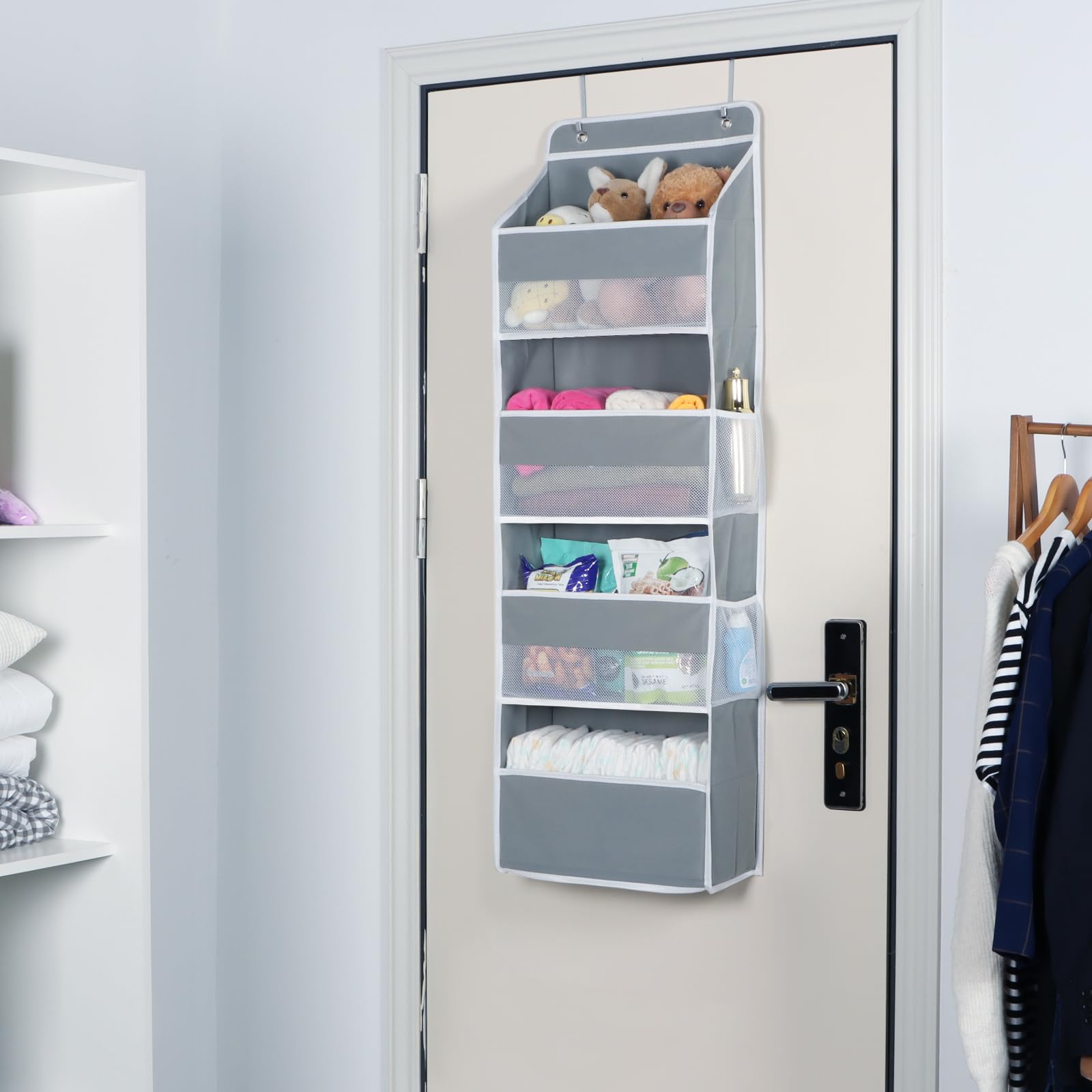 Univivi Baby door storage keeps diapers and bottles neatly organized.