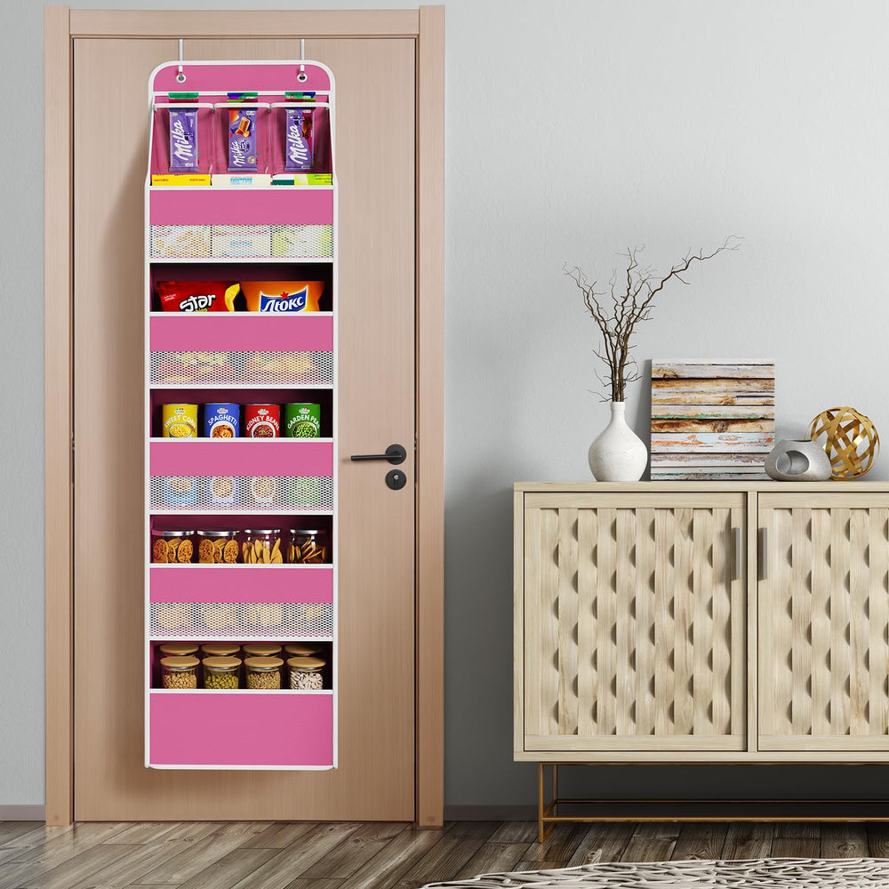 Univivi over-door organizer pink installed on a door demonstrates easy access to baby gear.