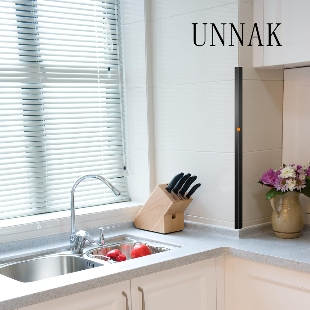 UNNAK wall protection guard installation—easy to fit with adhesive.