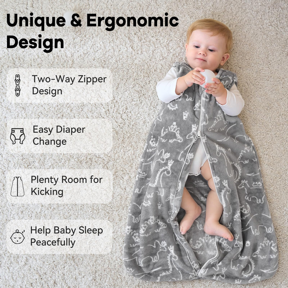 Unnivoll fleece sleep sack gray dinosaur, toddler wearing it, roomy yet snug for active movement.