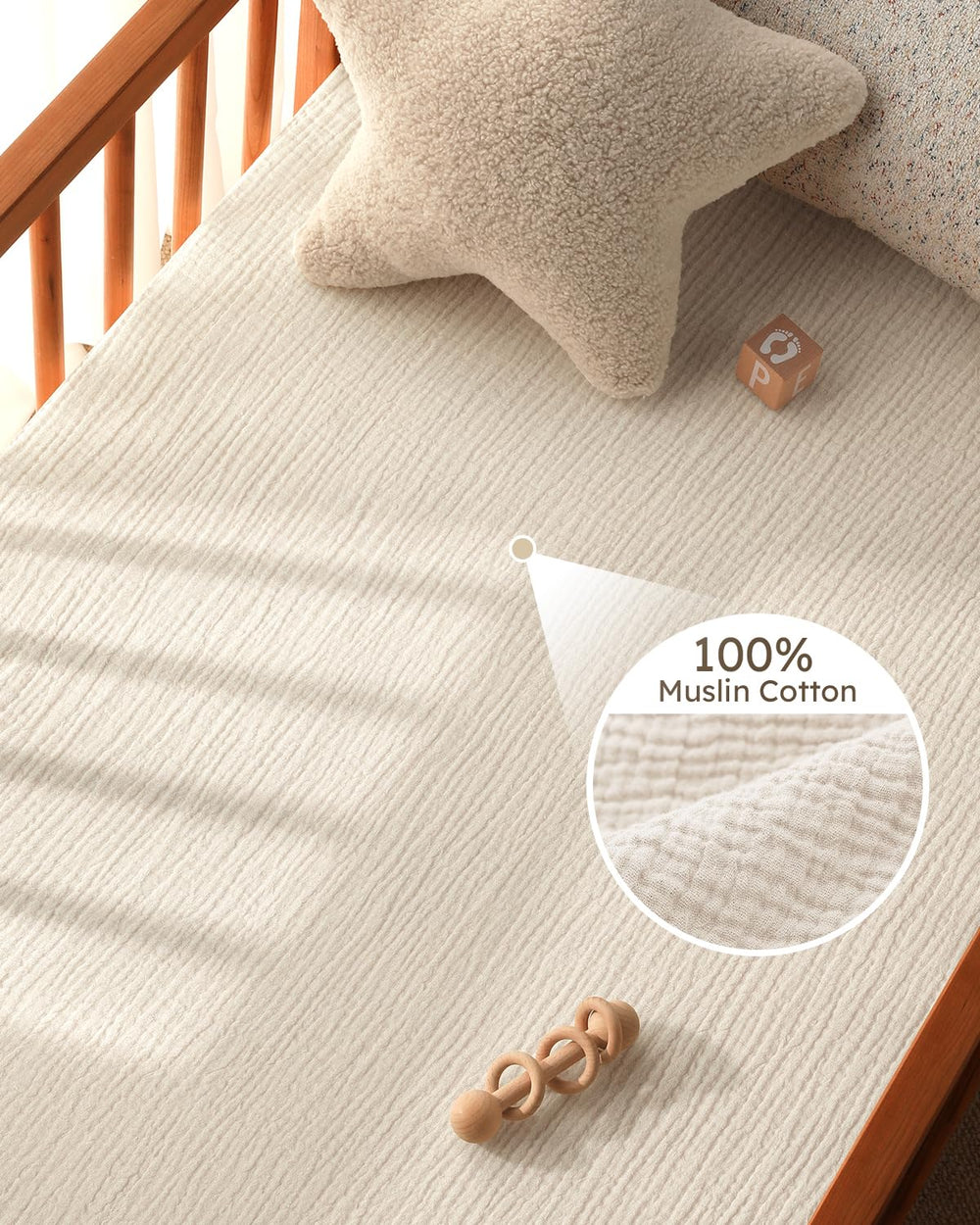 Unnivoll Muslin Crib Sheets two-pack in beige and khaki for versatile nursery styling.