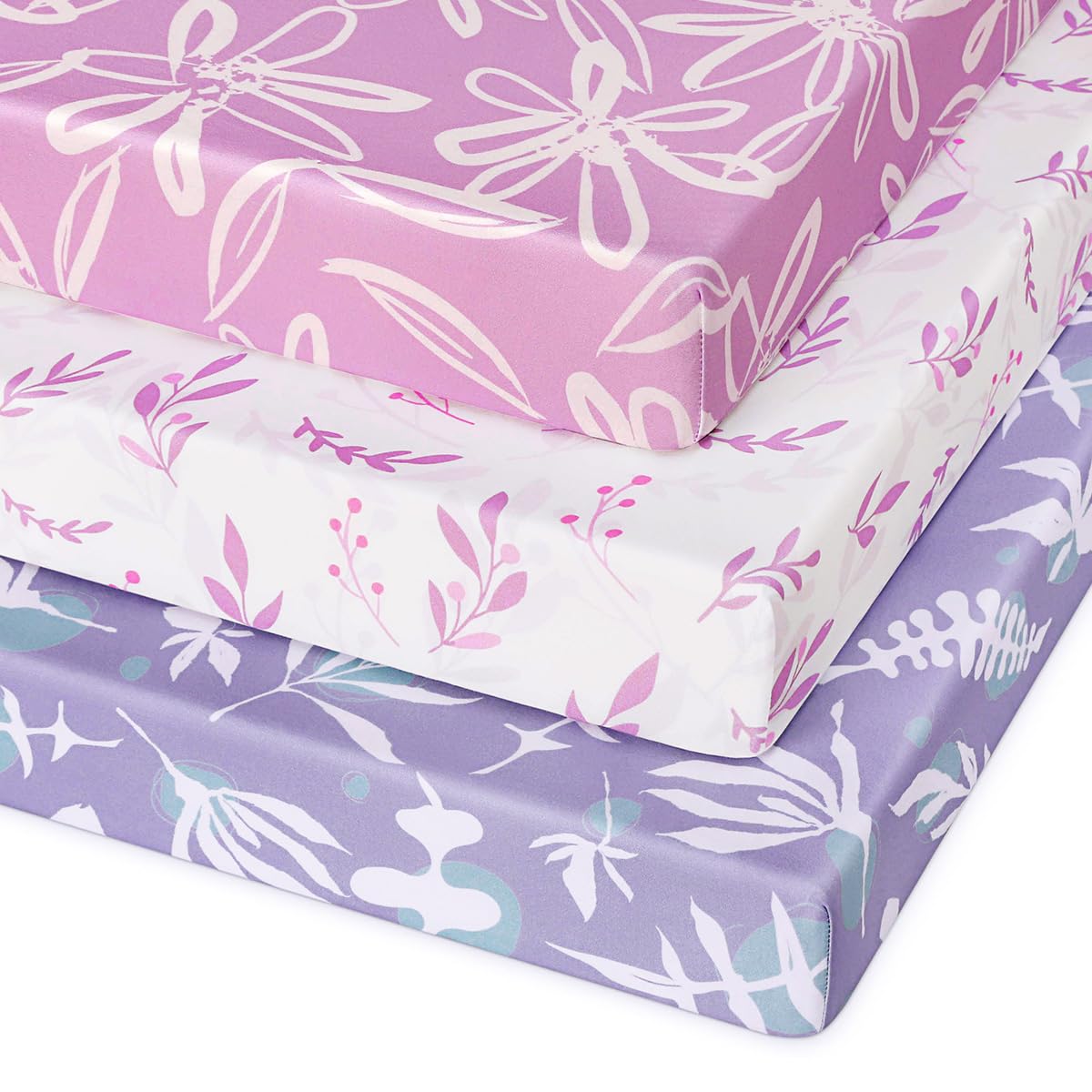 Unnivoll pack and play sheets folded closeup showing ultra-soft microfiber for baby's comfort.