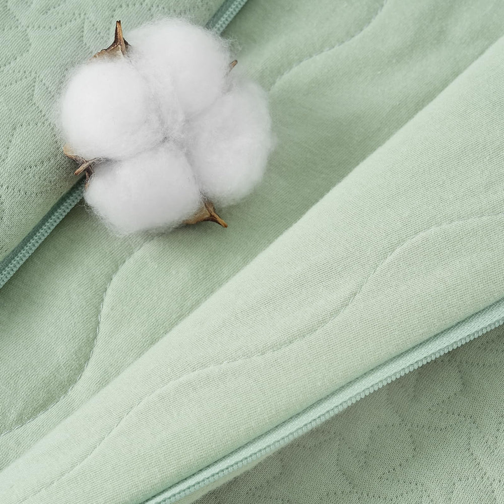 Unnivoll sleep sack size range shown supports ages 0-24 months.