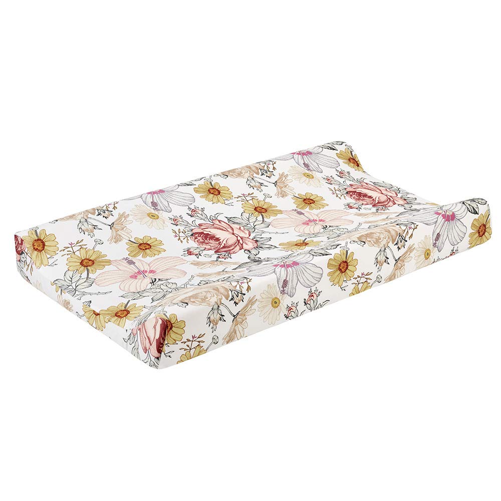 unp Stretchy Changing Pad Cover flower-on-table for gentle, comfortable diaper changes.