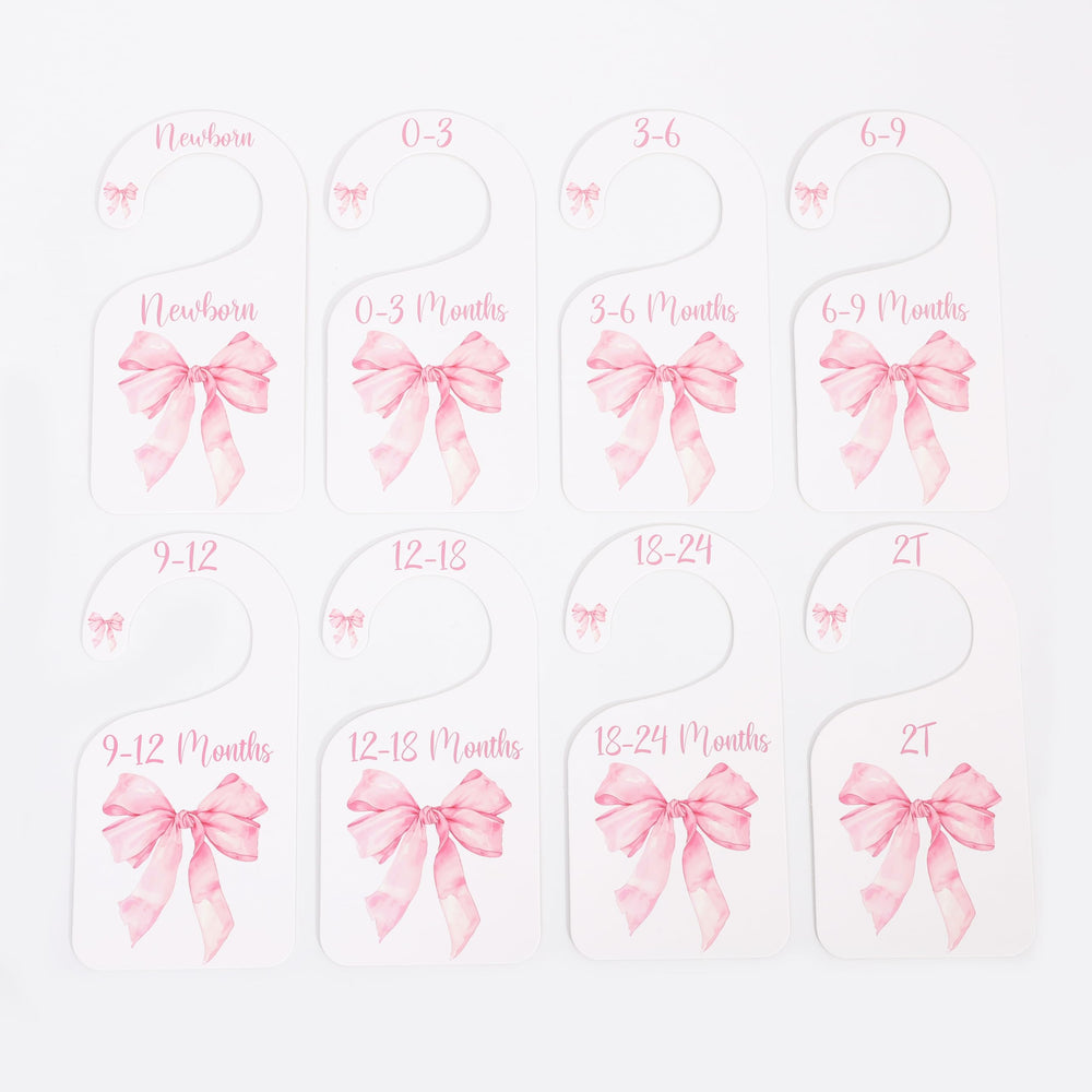 UOAOU baby closet divider set enhances nursery storage with floral accents.
