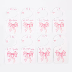 UOAOU baby closet divider set enhances nursery storage with floral accents.