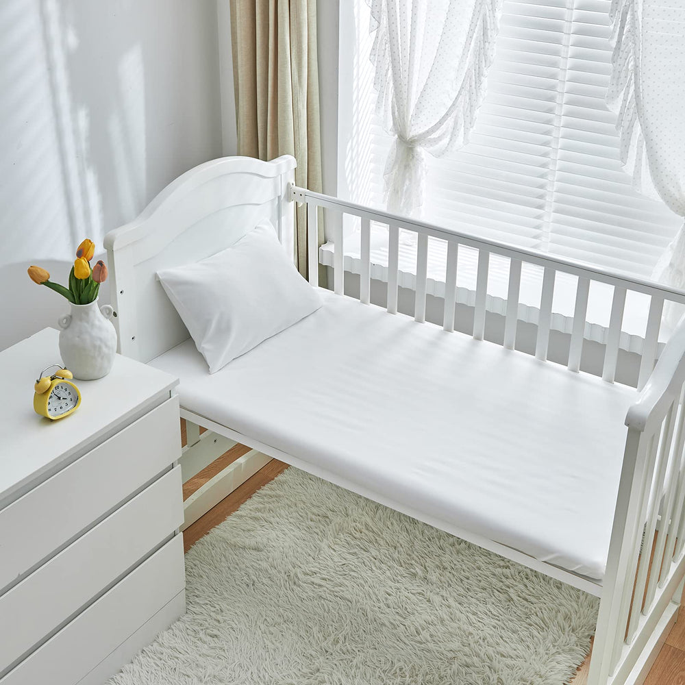 UOZZI BEDDING pink ruffle crib set adds gentle sweetness