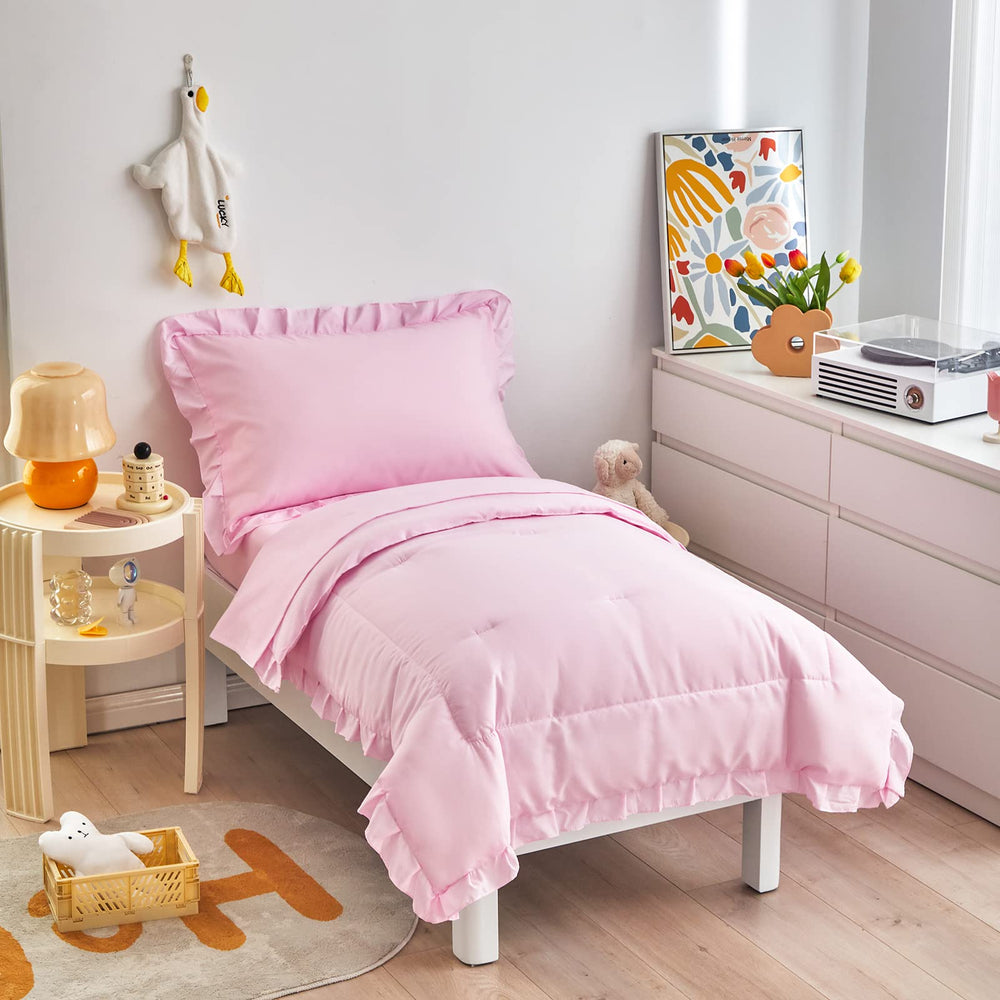 UOZZI BEDDING 4-piece pink toddler set with ruffle comforter for cozy sleep.