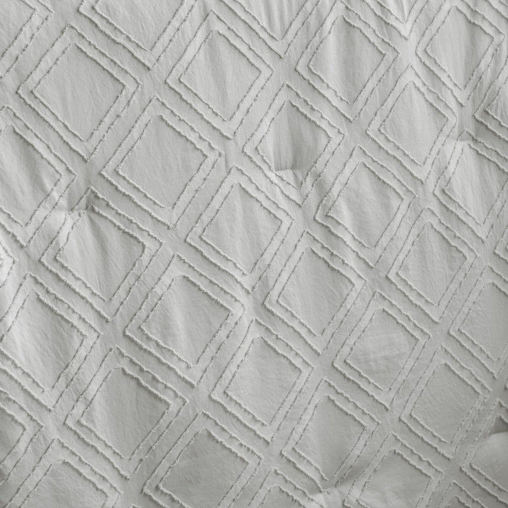 UOZZI BEDDING crib sheet closeup demonstrates secure fit for standard crib mattresses.
