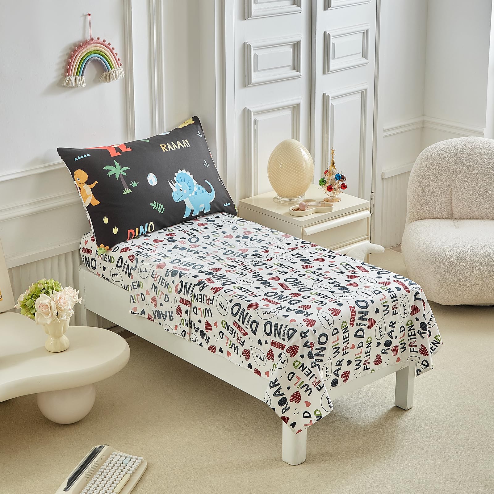UOZZI BEDDING four-piece set on dark backdrop highlights complete bedtime solution.