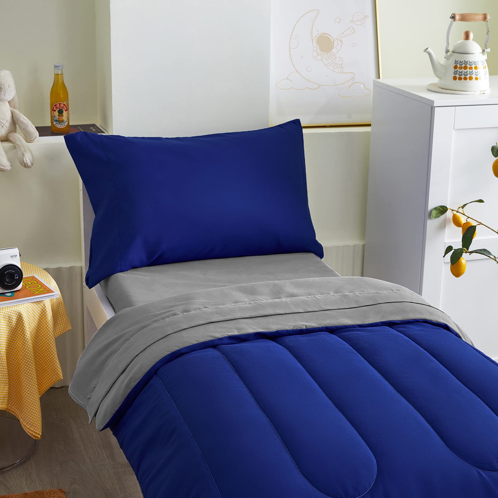 UOZZI Bedding flat sheet in royal blue gray adds smooth breathable coverage.