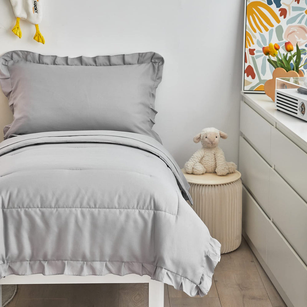 UOZZI Bedding gray ruffle close-up highlights soft texture.