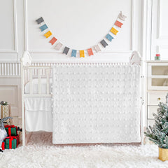 UOZZI Bedding mini crib 3pc set in white offers soft, breathable comfort for baby's nap