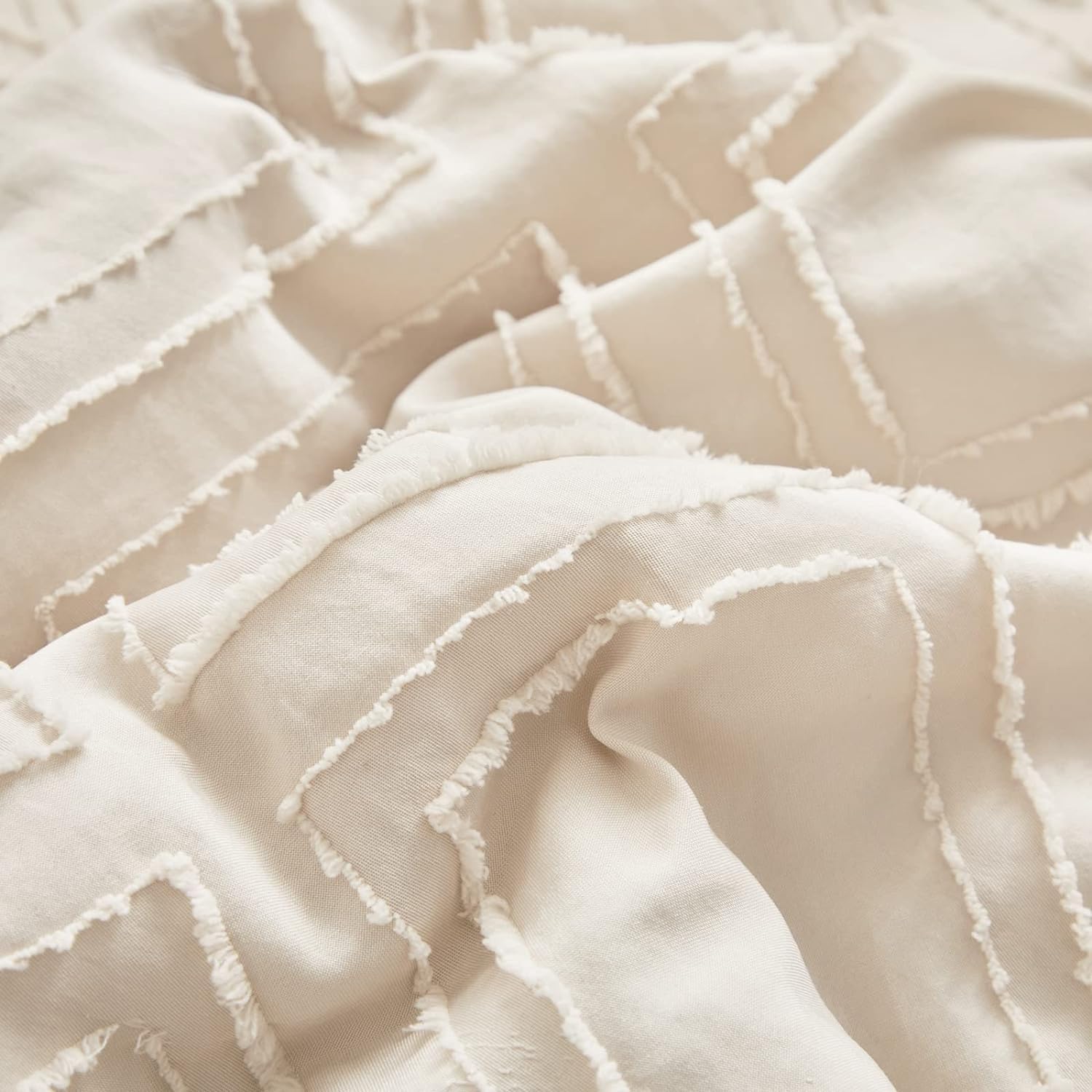 UOZZI BEDDING mini crib boho chic design showcases tufted embroidery.