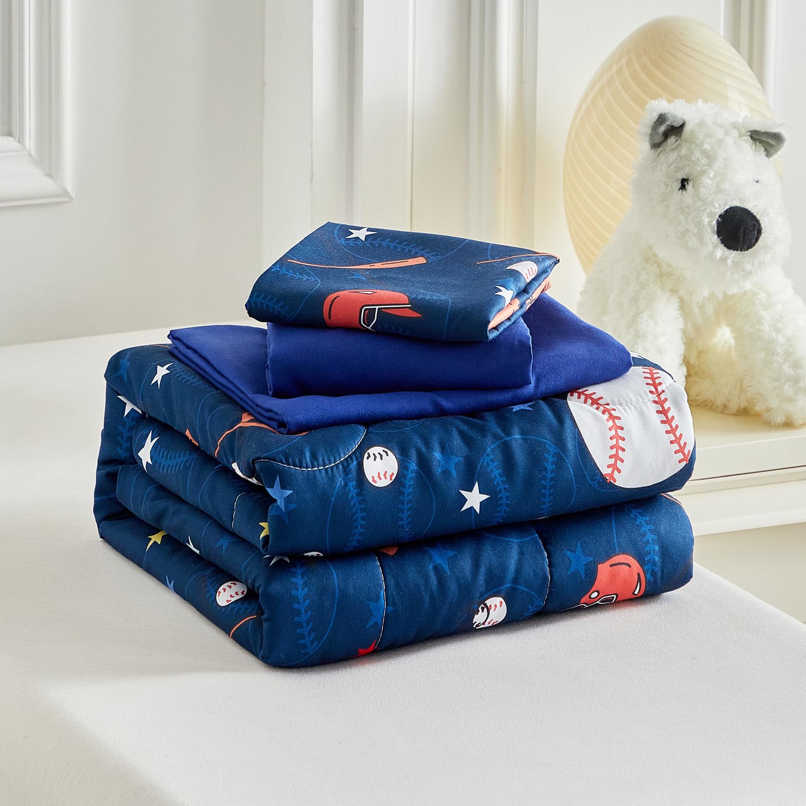 UOZZI BEDDING navy-blue colorway complements any toddler room styling.