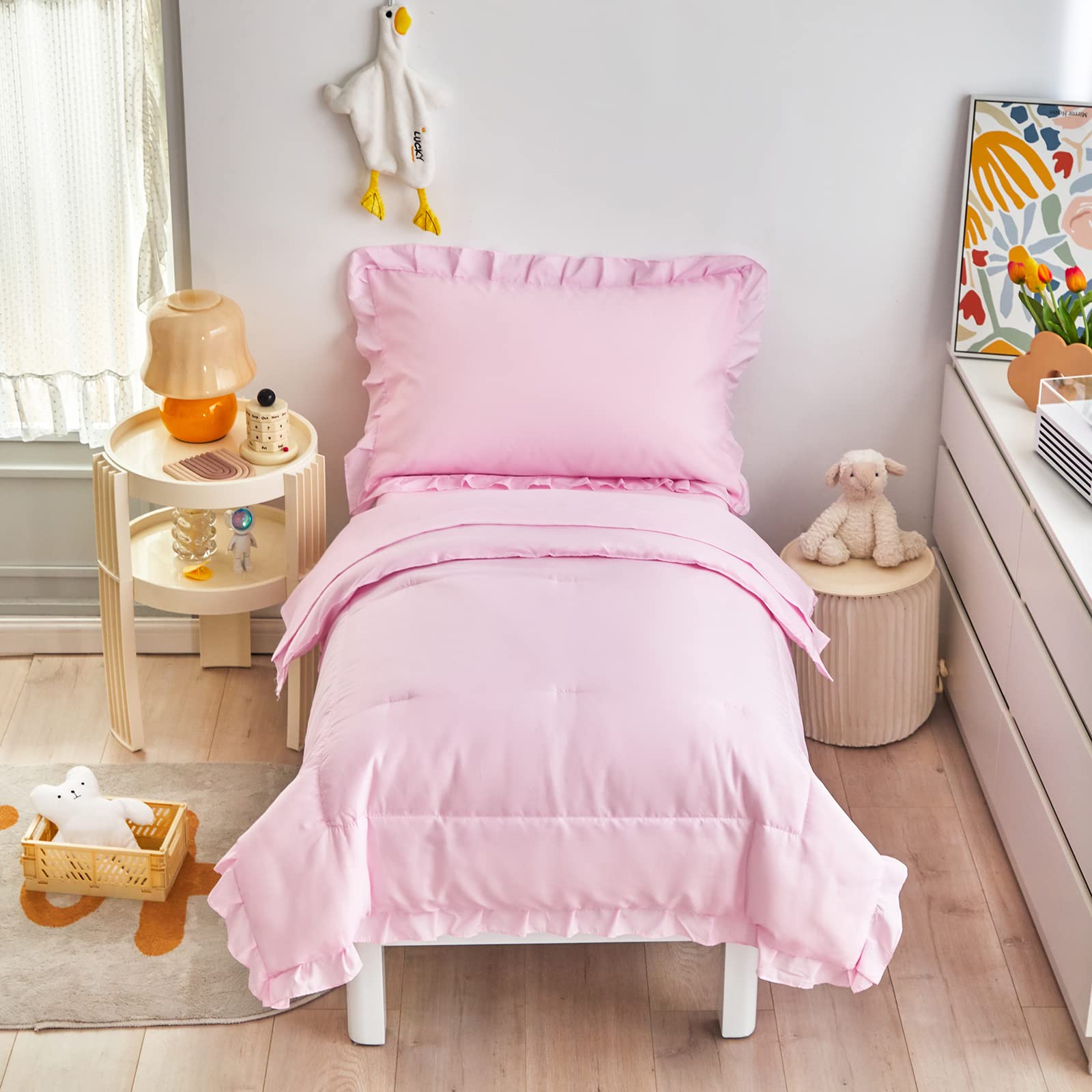 UOZZI BEDDING pink ruffle-edge comforter close-up shows soft microfiber feel.