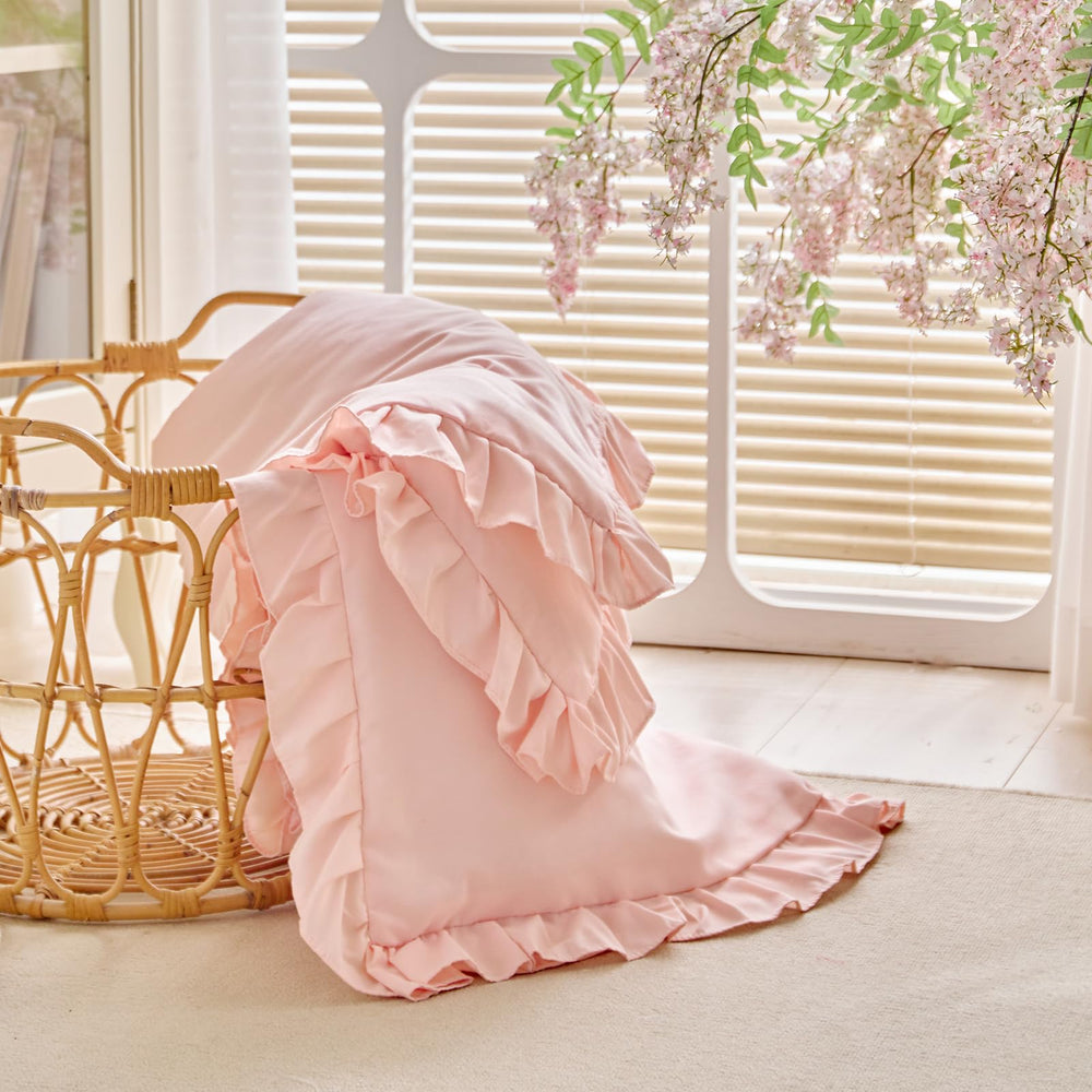 UOZZI Bedding ruffle edge detail highlighting cute nursery charm