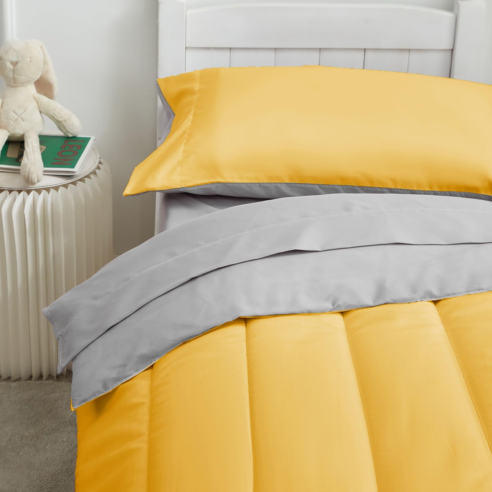 UOZZI BEDDING yellow reversible comforter on bed for cozy nights.