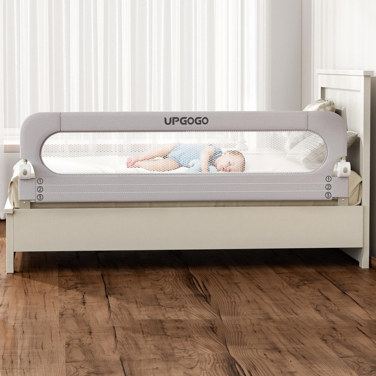 UPGOGO folding bed rail for toddlers provides a safer sleep barrier.