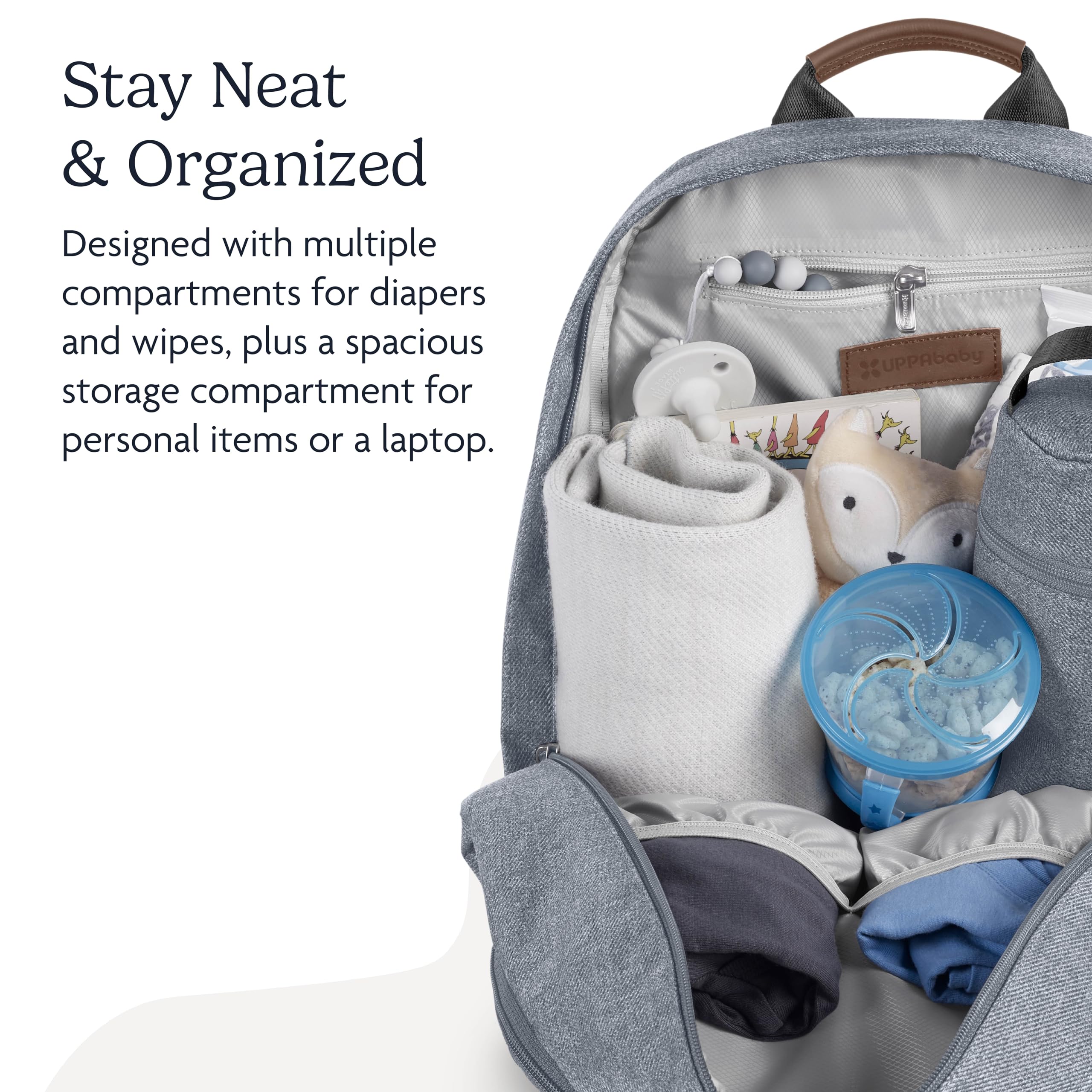 UPPAbaby Declan multiple compartments organize diapers, wipes, and personal items.
