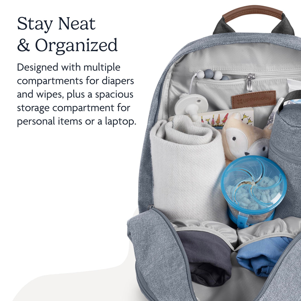 UPPAbaby Declan multiple compartments organize diapers, wipes, and personal items.