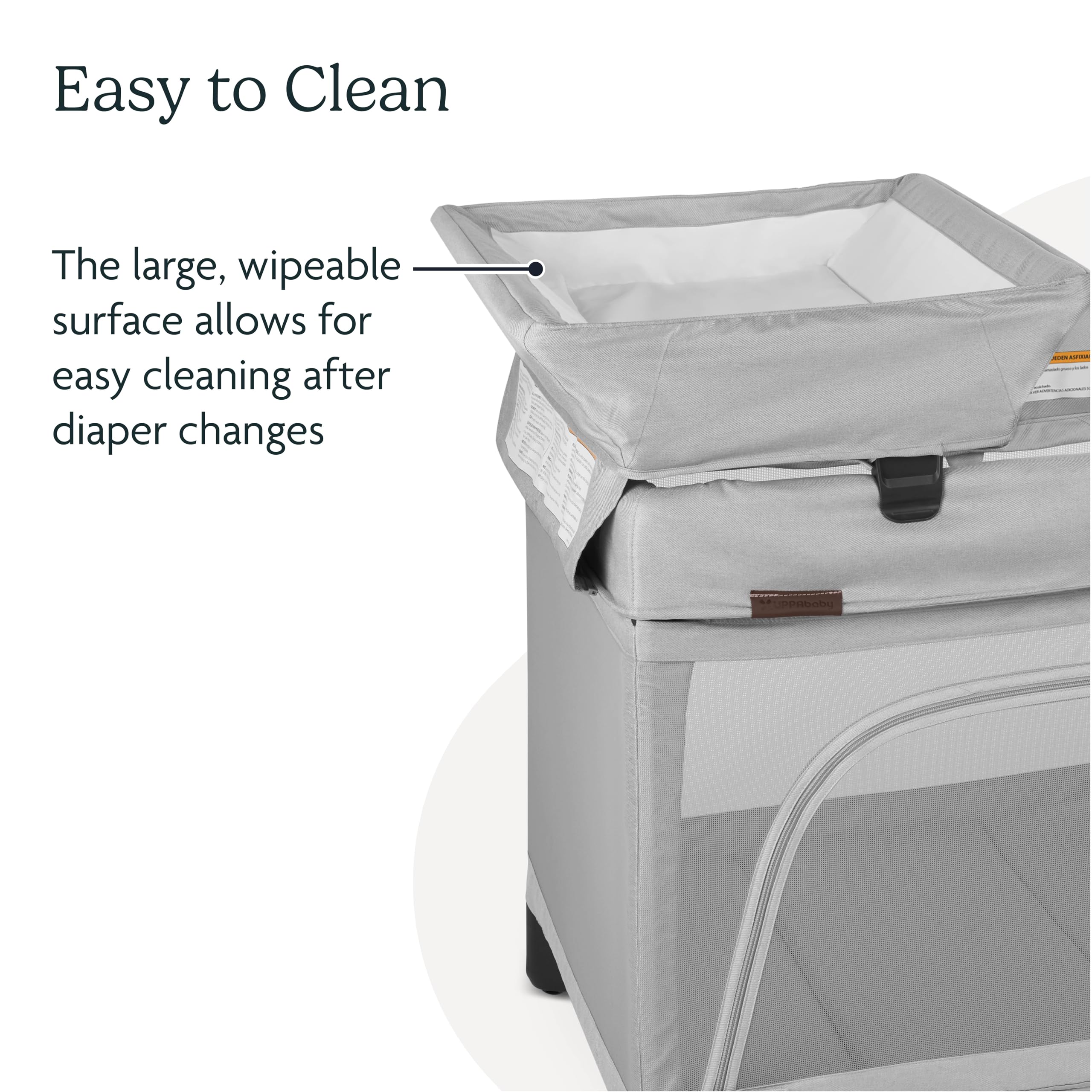UPPAbaby Remi changing station rotates into storage for space-saving transitions.