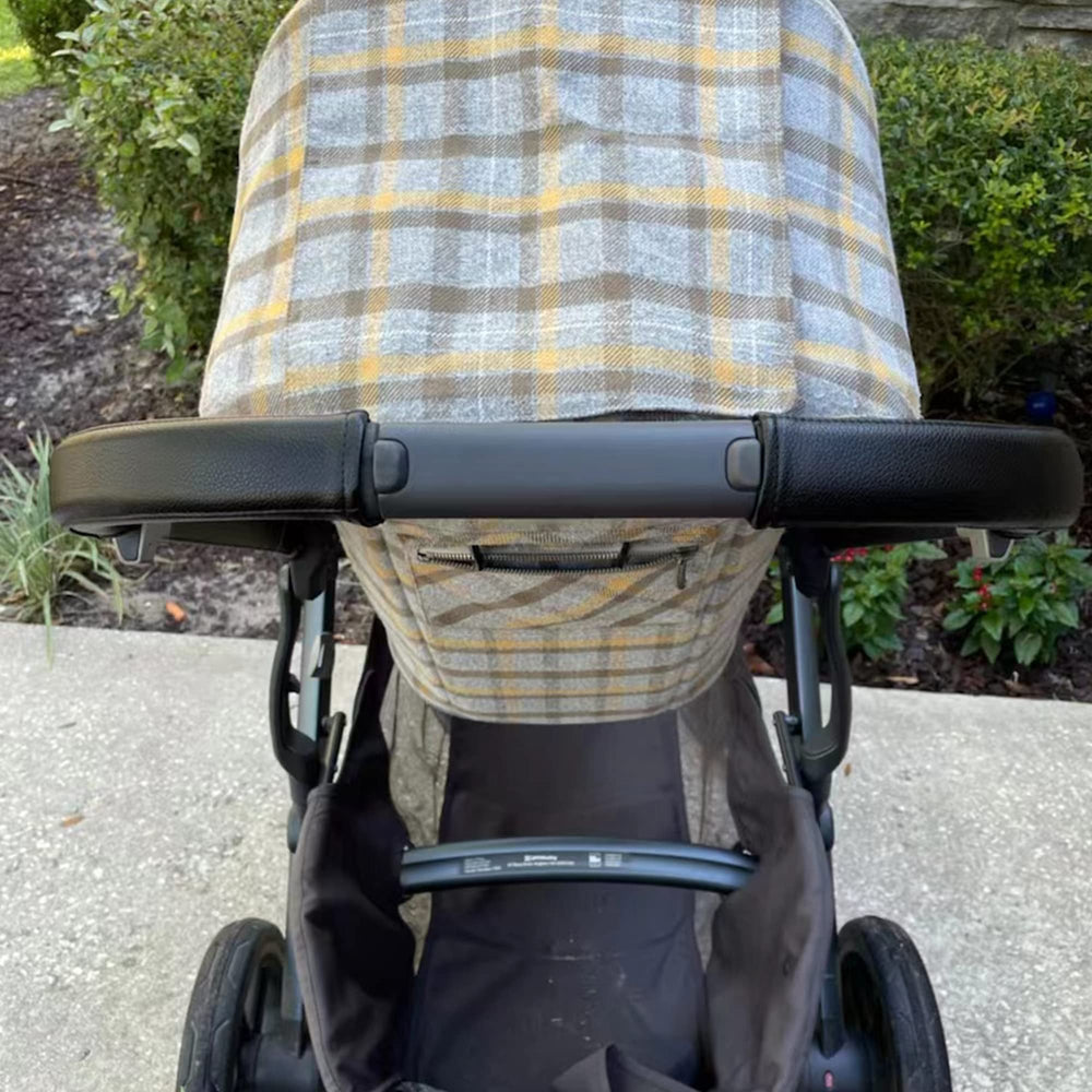 Uppababy Vista handlebar cover zipper design closeup for easy installation and removal.