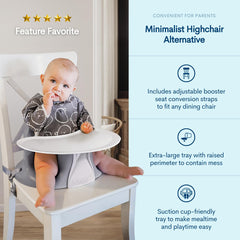Upseat baby eating at table showing versatile use for meals