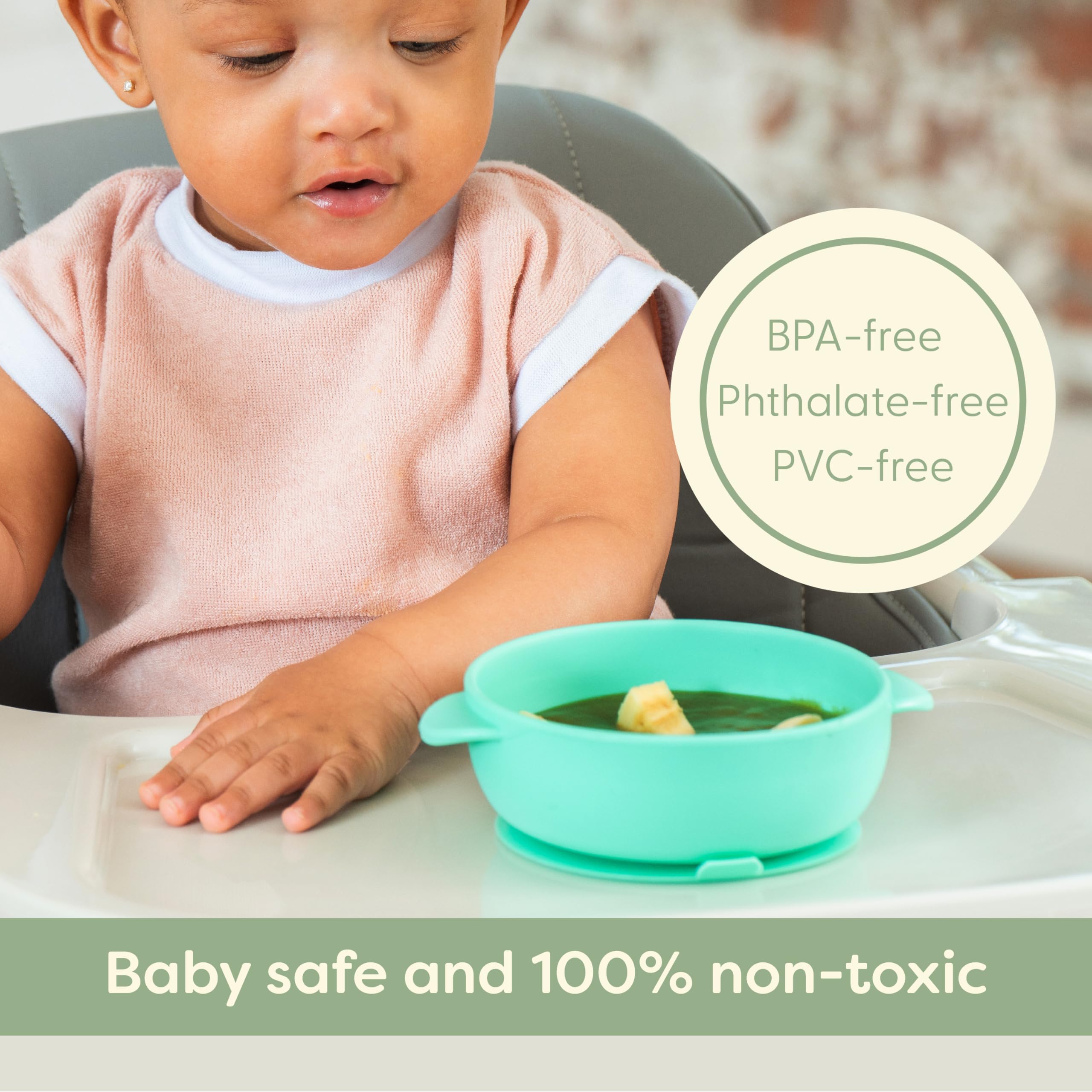 UpwardBaby silicone spoon with easy-grip handle for self-feeding.