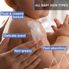 Swatch of Uriage Baby Cream on delicate newborn skin.