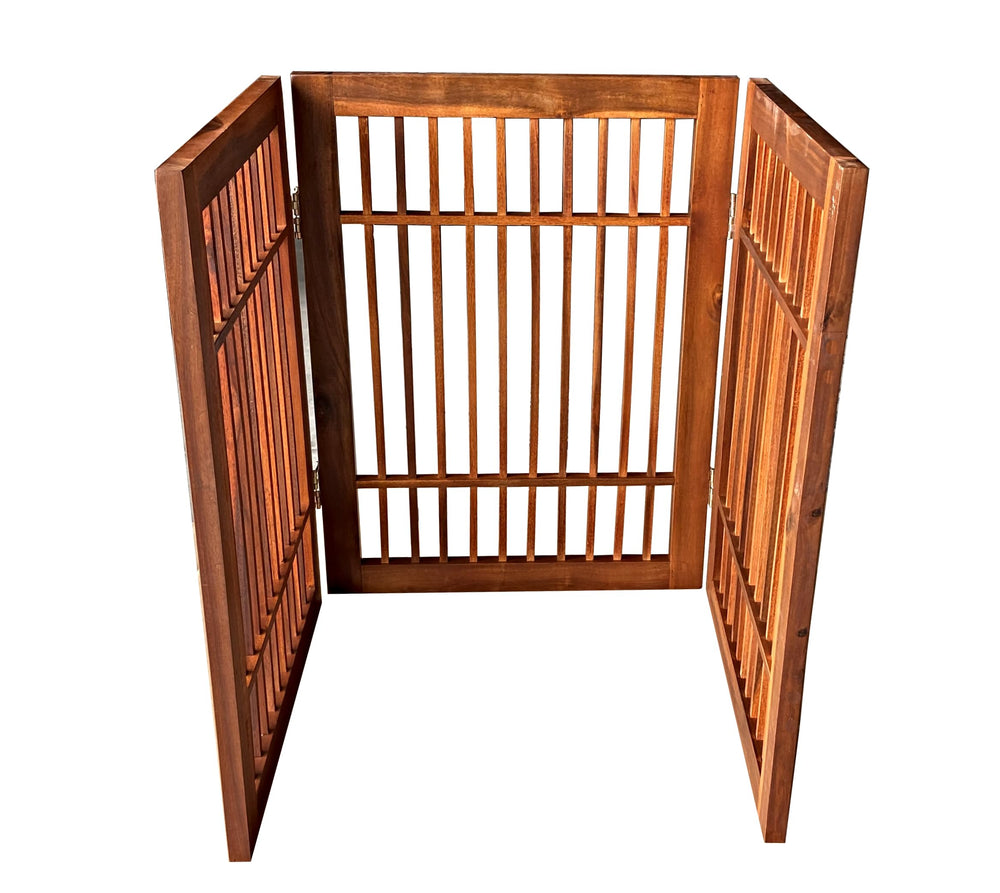 Urnporium durable acacia hardwood gate standing in a room corner as decor and barrier.