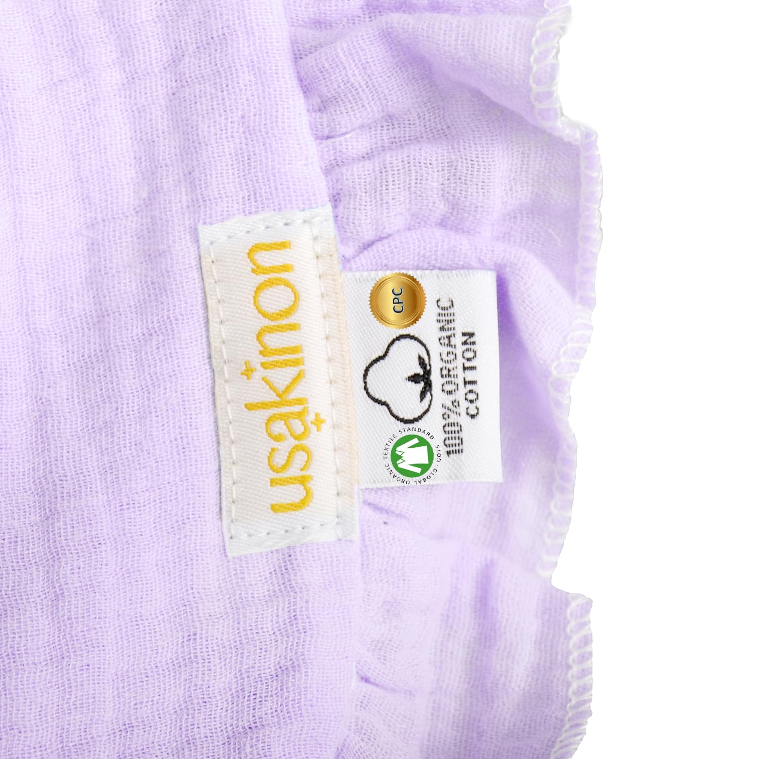 usakinon pastel bibs for daily drool and mealtime messes.