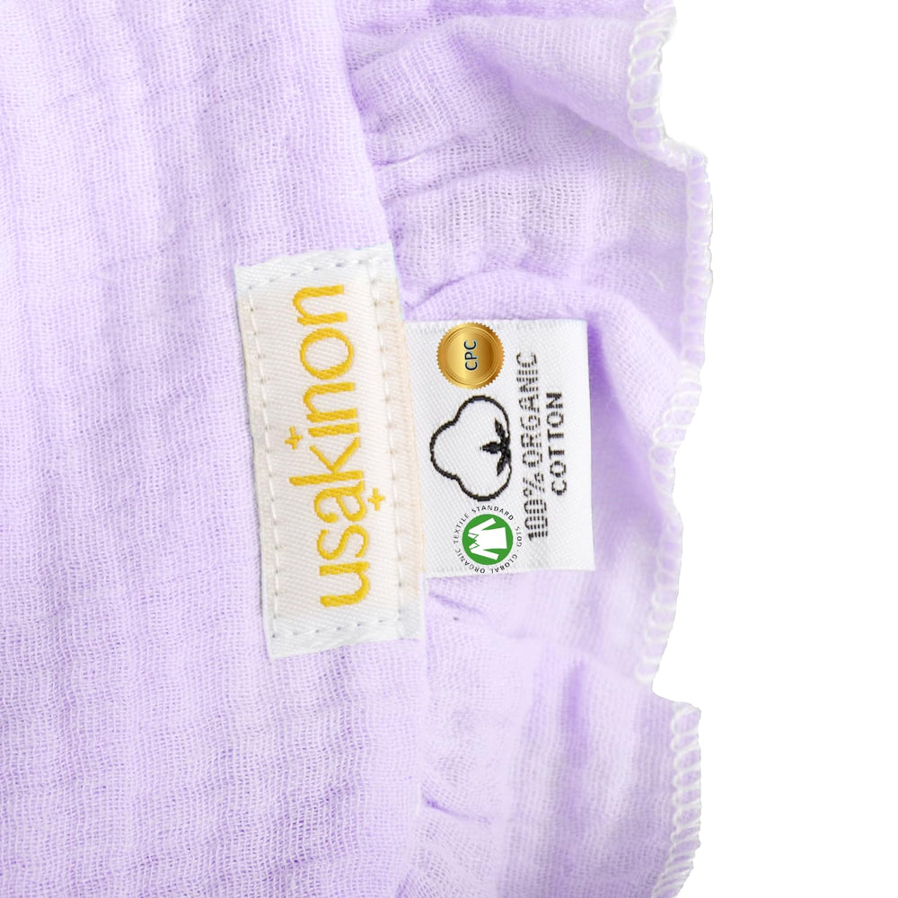 usakinon pastel bibs for daily drool and mealtime messes.