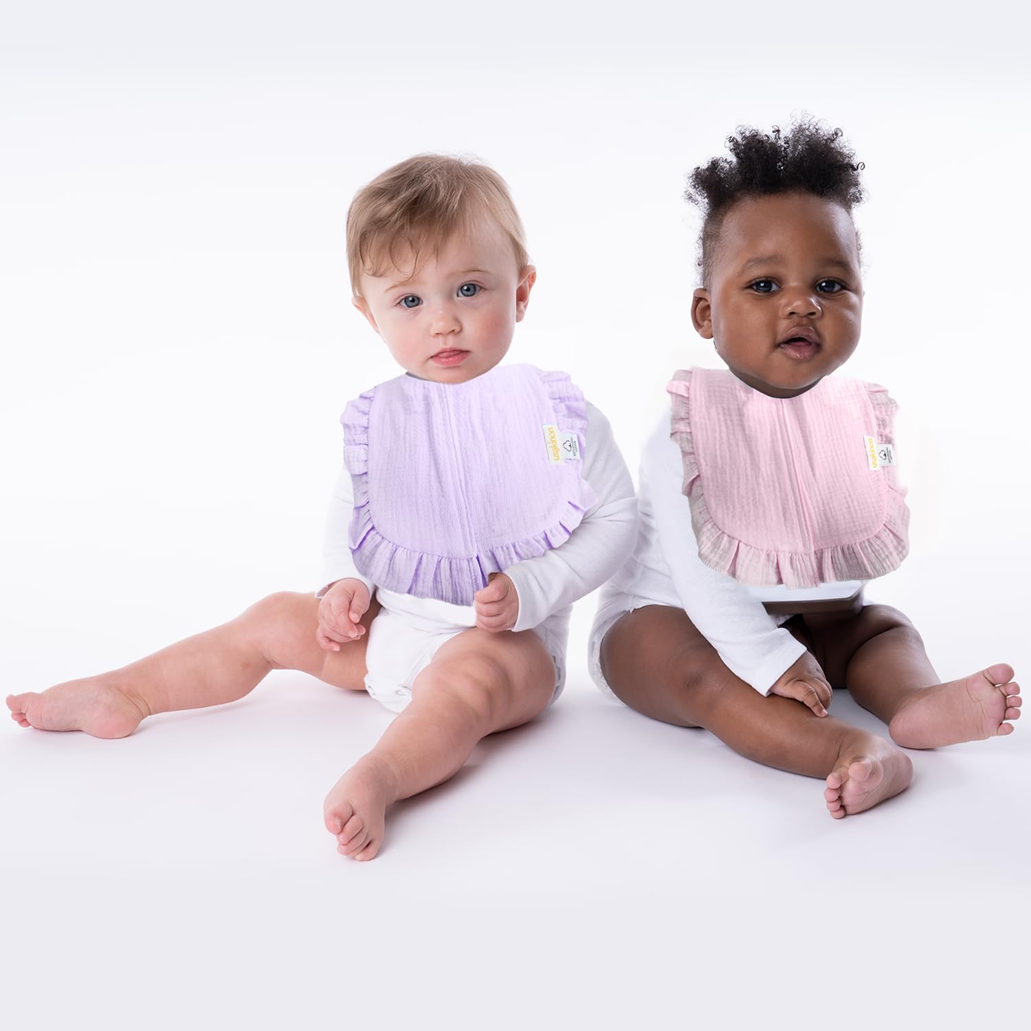 usakinon ruffle-trim pastel bibs enhance baby shower gifts.