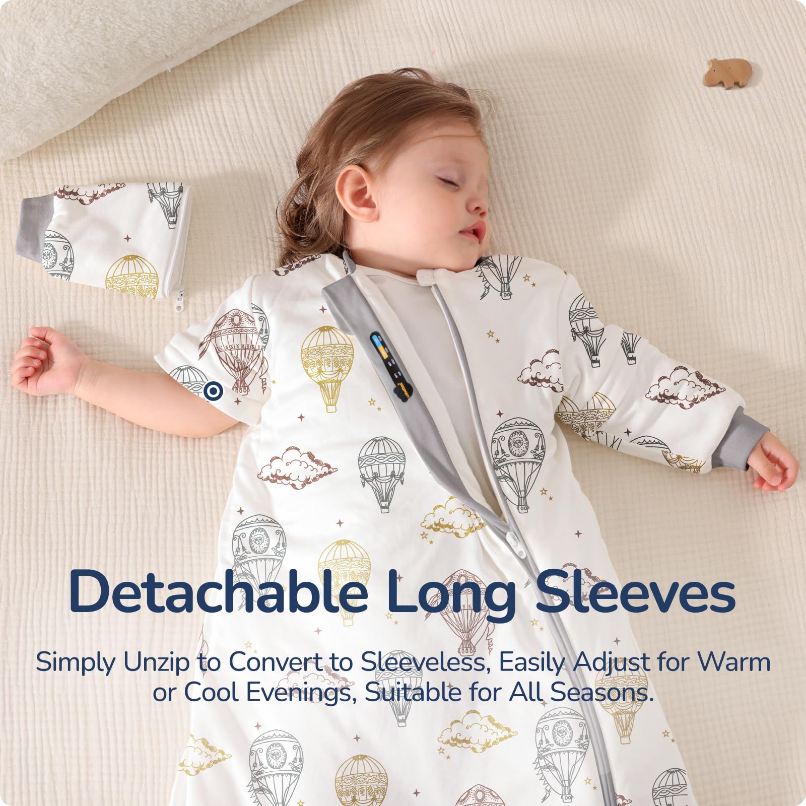 usbettas baby sleep sack detachable sleeves demonstrates year-round versatility for naps and play.