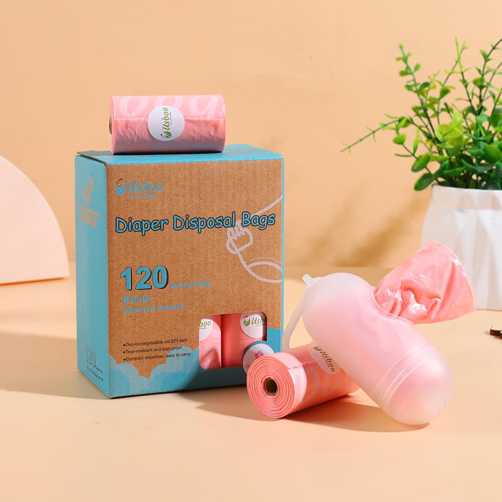 USBOO compact pink dispenser for on-the-go use.