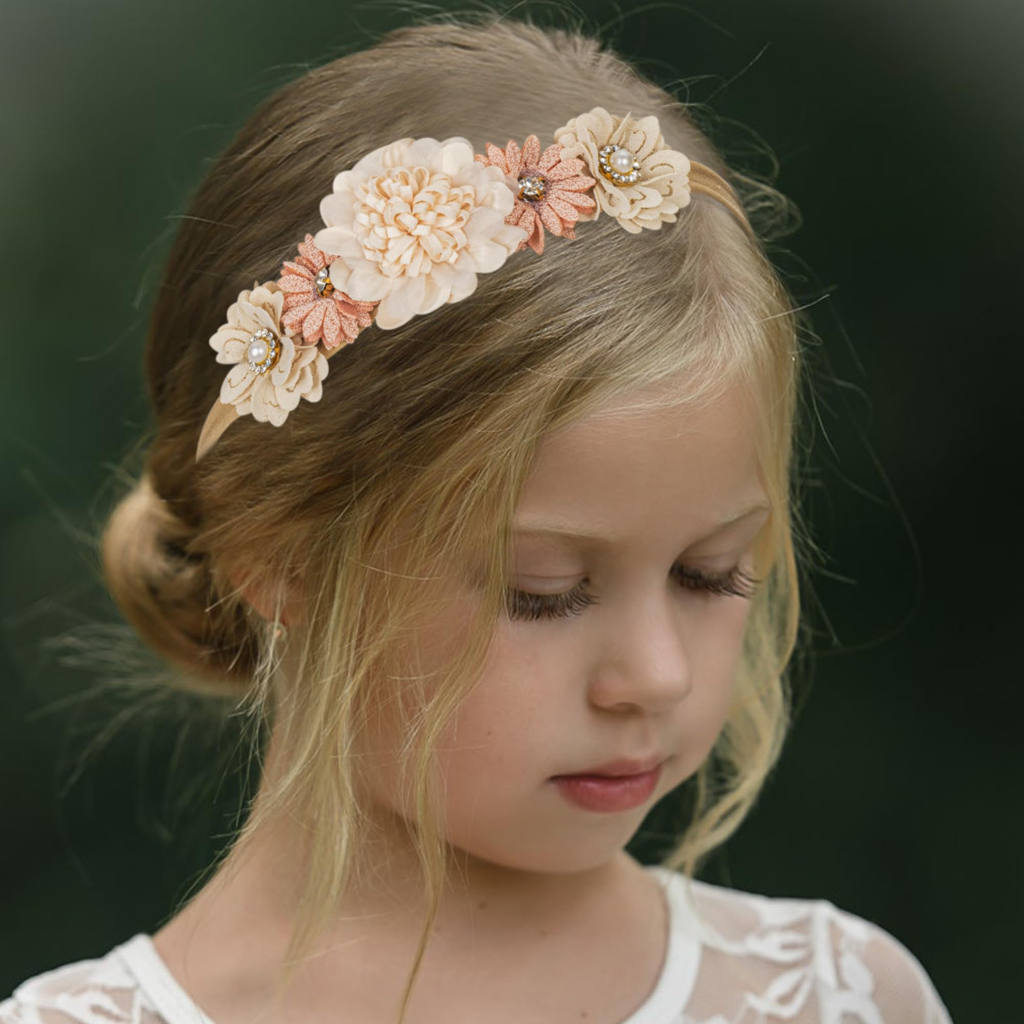 Utaly back-pad floral crown secured without slipping on tiny heads.