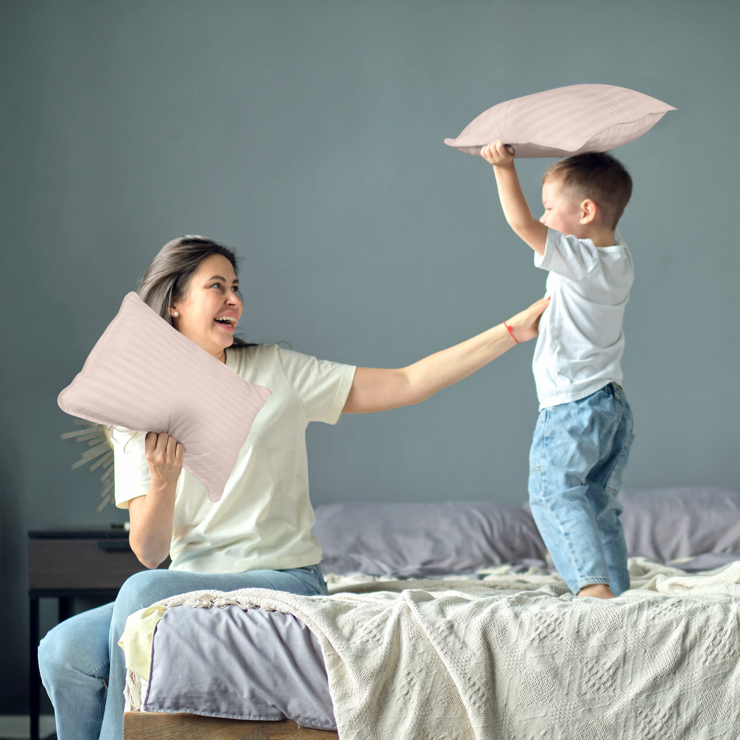 Utopia Bedding Toddler Pillow care instructions shown for spot-clean or hand-wash longevity.