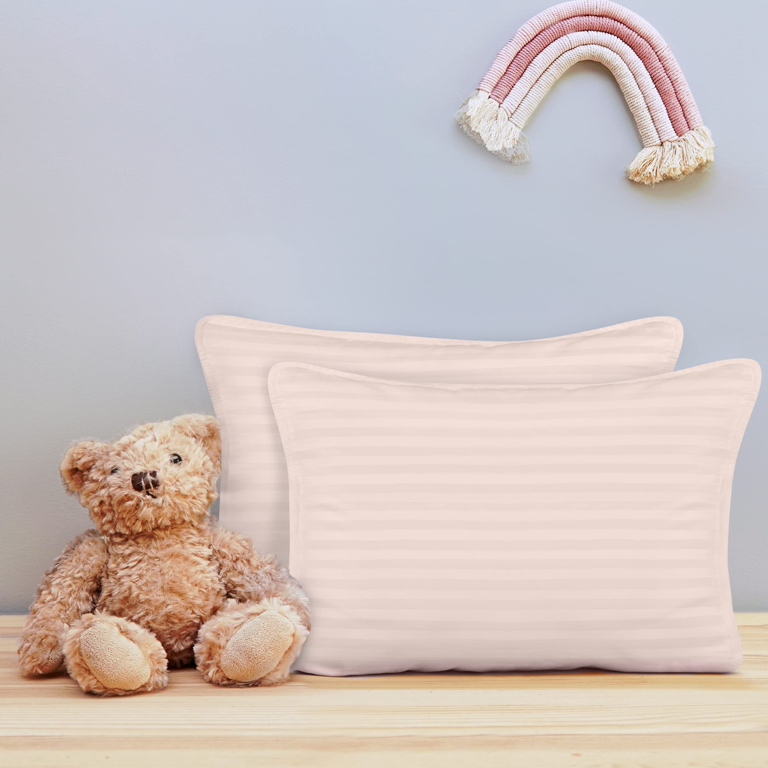 Utopia Bedding Toddler Pillow cotton-blend cover texture suggests durability and easy care.
