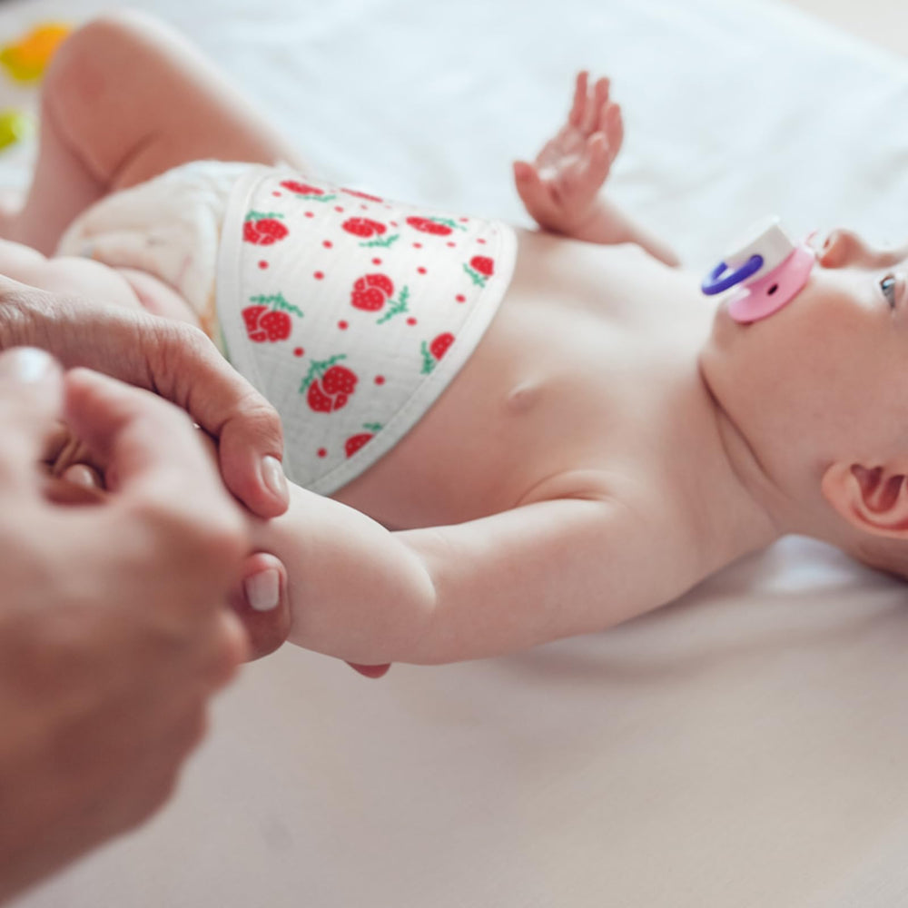 Vabean baby wearing belly wrap demonstrates cozy, snug fit during sleep.