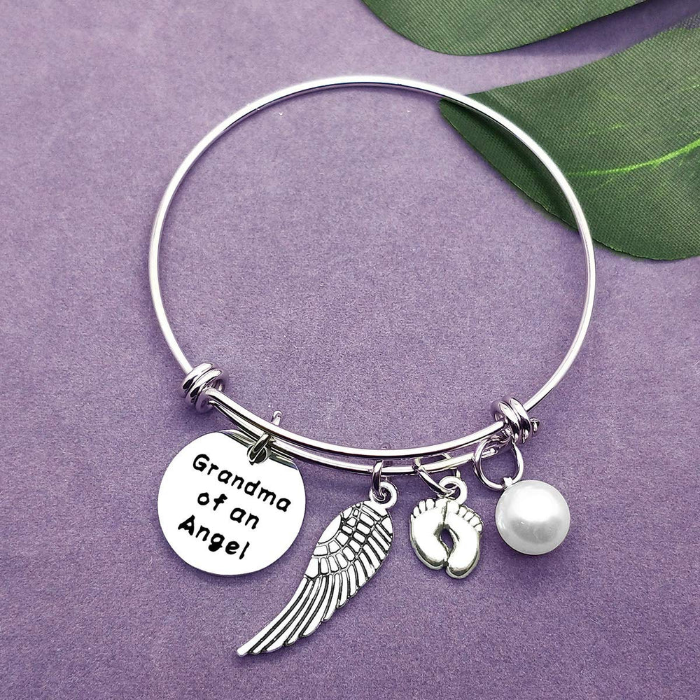 Vadaka Baby Memorial Bracelet free velvet pouch enhances keepsake presentation.