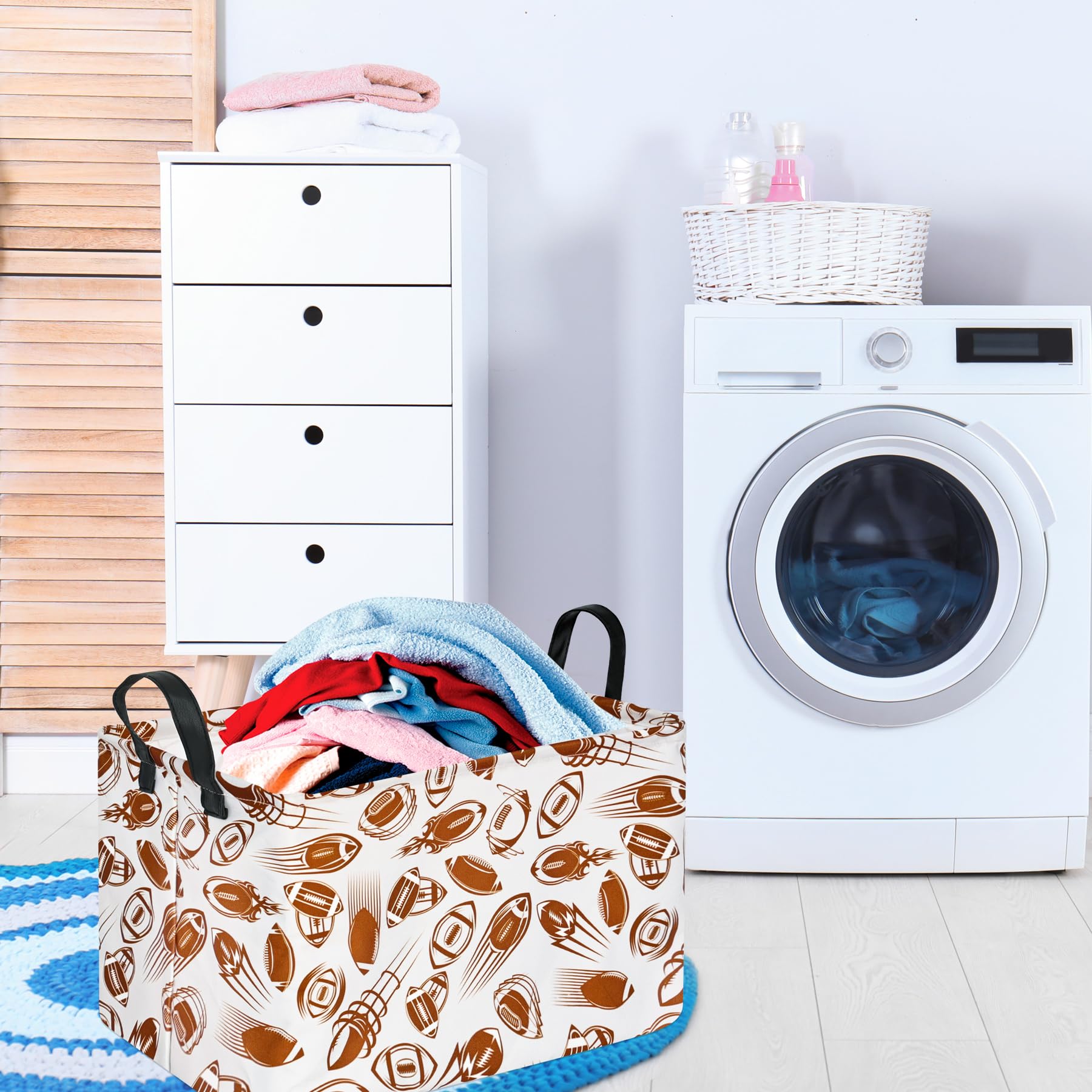VAIVUSTO Rec football print bin with towels illustrates practical nursery organization.